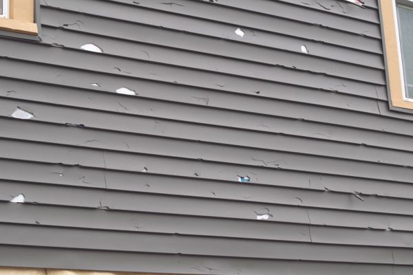 Damaged Siding Replacement in Avon